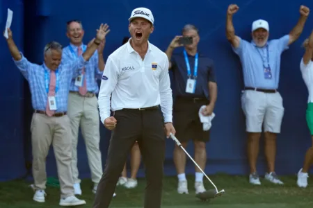 Brennan wins Wyndham Championship and qualifies for PGA Tour postseason